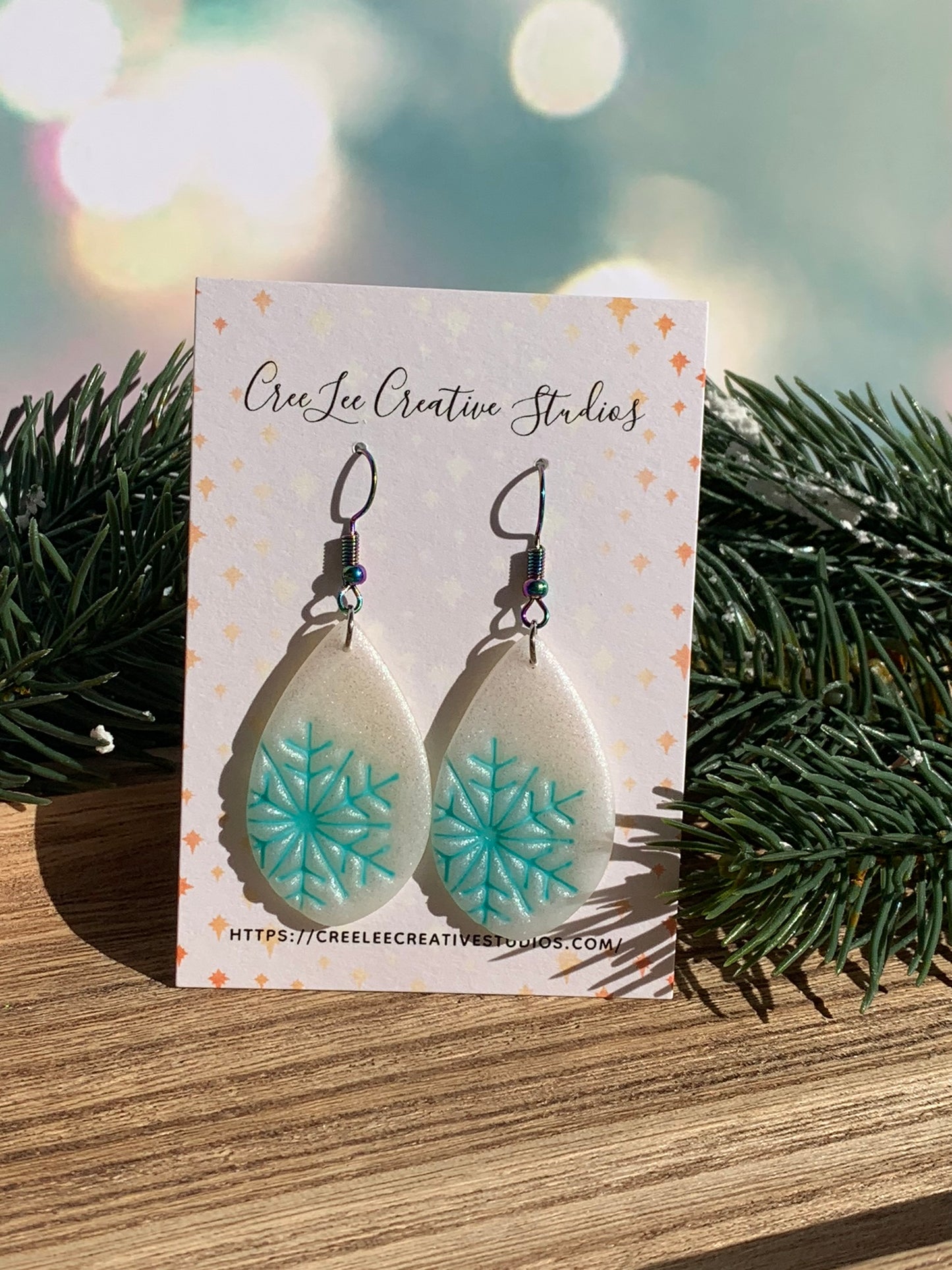 "New" Winter - Iridescent White Teardrop with Aqua Blue Snowflake Earrings