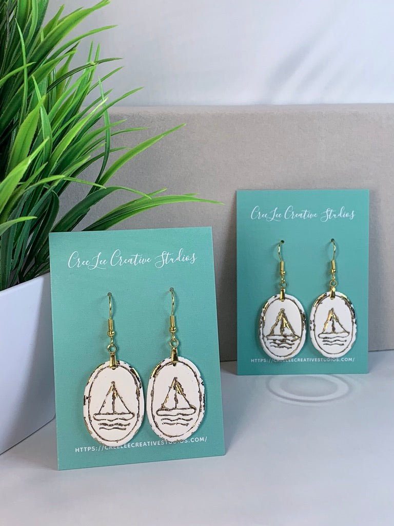 New - Gilded Voyage Earrings – Handmade Gold Foil Sailboat Polymer Clay Dangle Earrings
