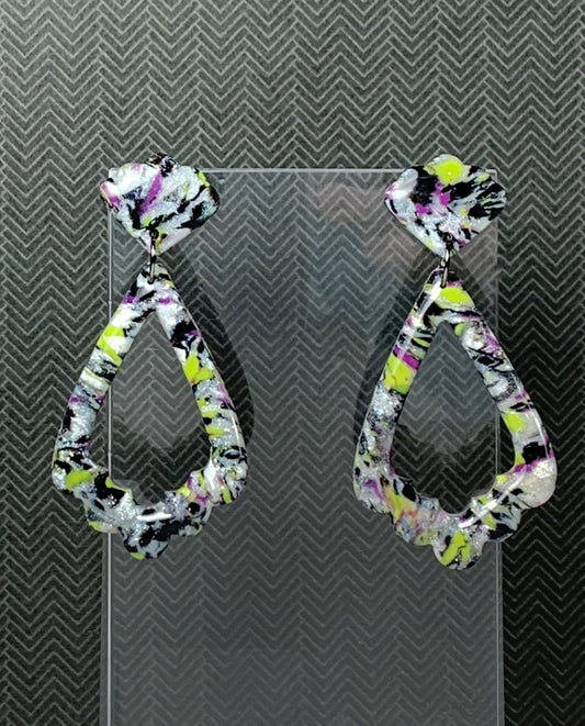 A pair of marbled earrings with swirls of green, purple, black, and white, attached to stainless steel ear wires.